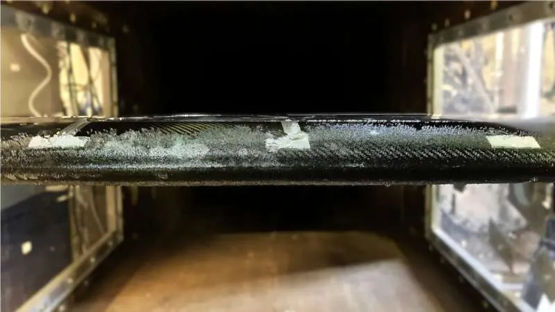 Using vibration to deice aircraft wings