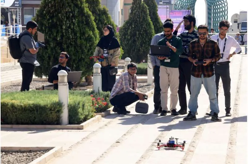 Engineering students conduct drone tests during the second edition of Iran's Tech Olympics